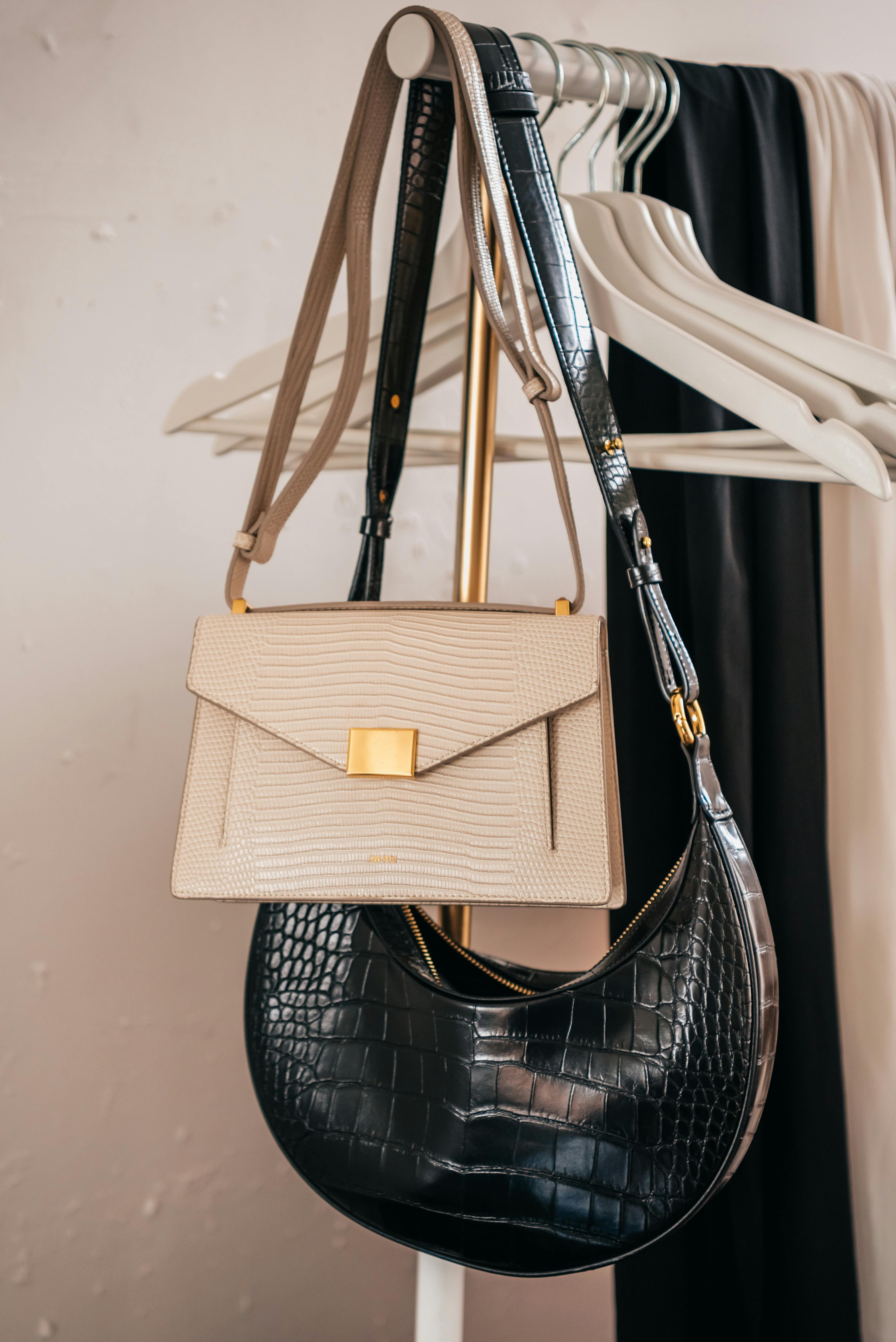 Elegant and classic leather croc shoulder bags in black and beige, curated by Styled After.