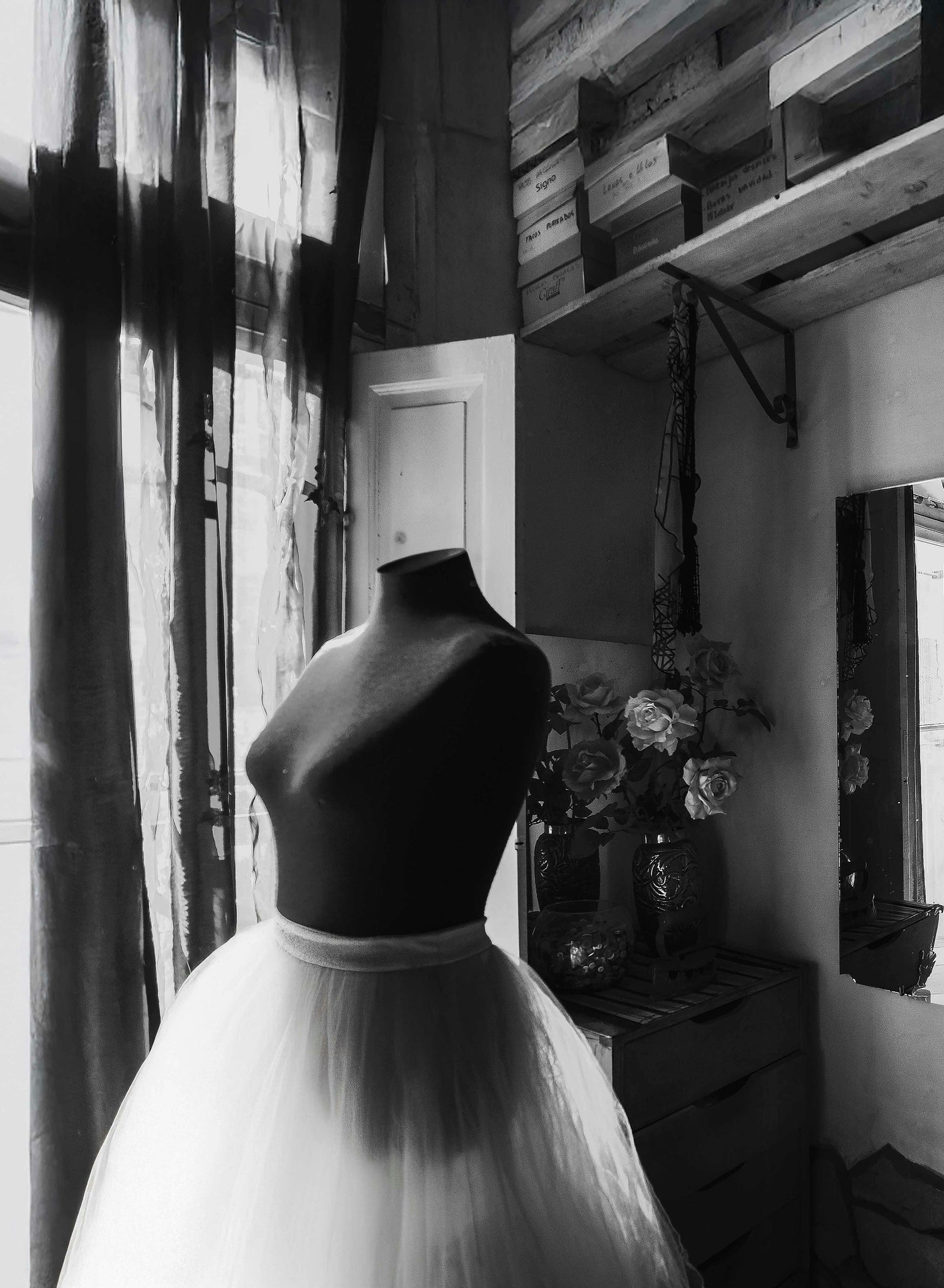 Design mannequin in a tulle skirt in a design room as fashion inspiration, curated by Styled After.